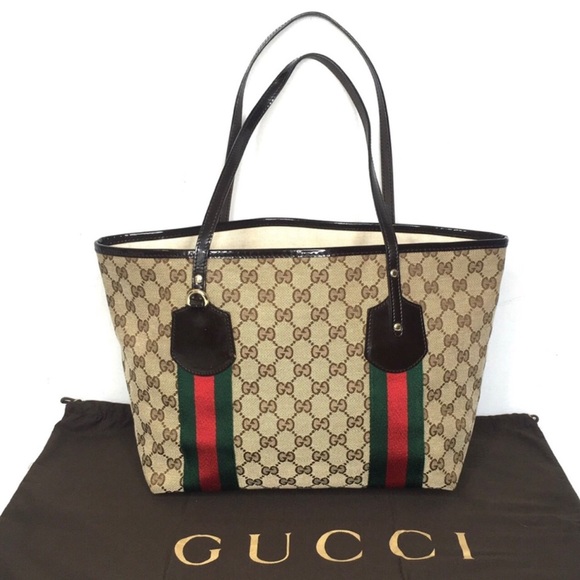 Gucci Handbags - Authentic Gucci brown monogram canvas tote ribbon accents